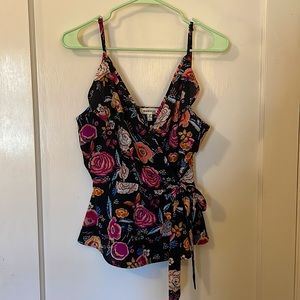 Floral wrap tank top with inner button closure and side tie